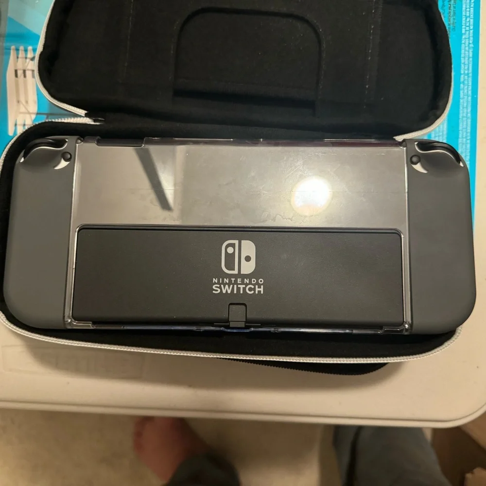 Nintendo Switch with Black and White Protective Case